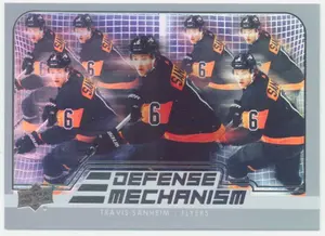 2022-23 UPPER DECK - TRAVIS SANHEIM #DM-30 DEFENSE MECHANISM