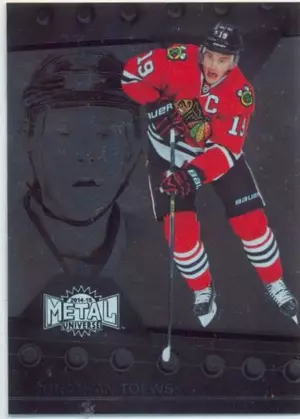 2014-15 FLEER SHOWCASE - JONATHAN TOEWS #11 METAL UNIVERSE